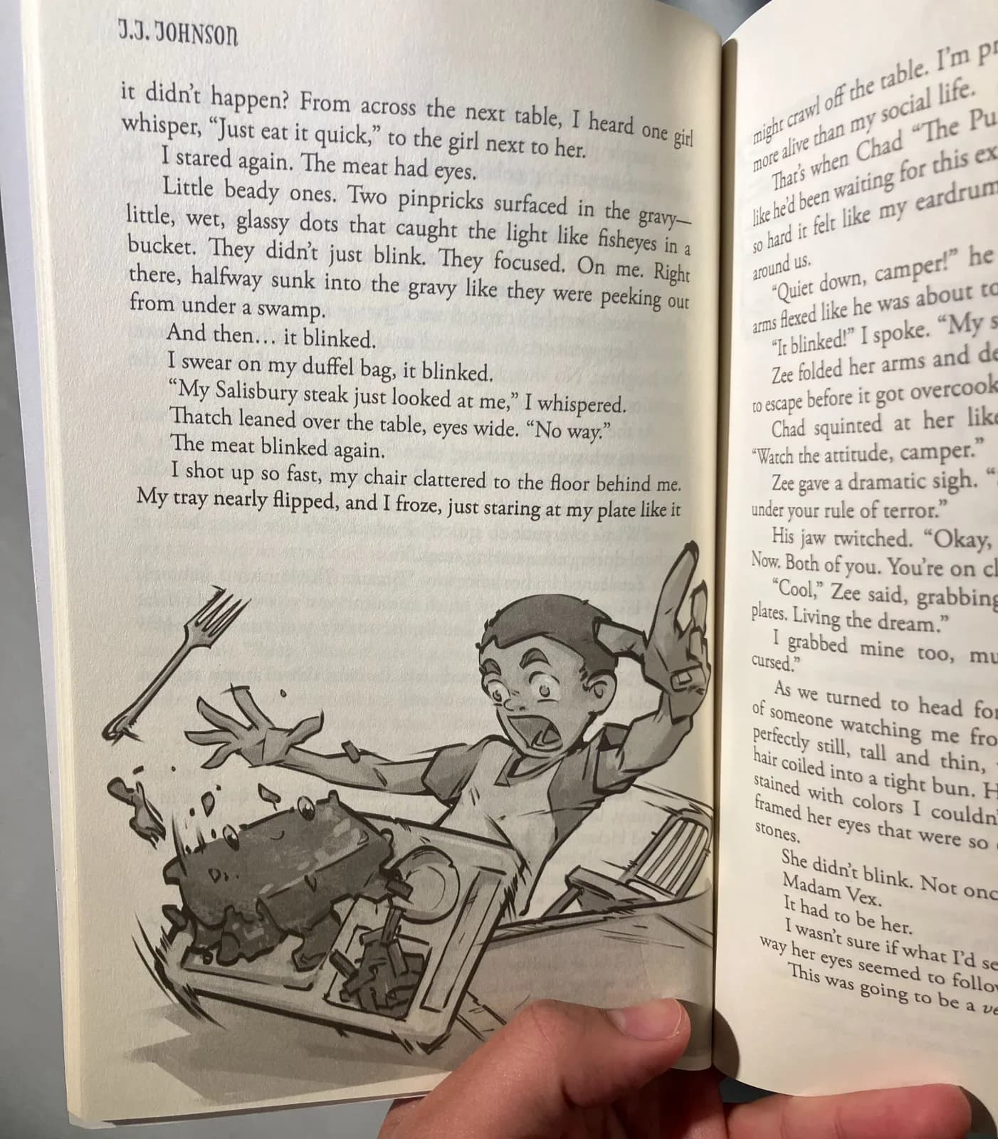 Photo of an open printed copy of Hurl at Camp Whurl showing an interior illustration of a boy knocking over his lunch tray in shock